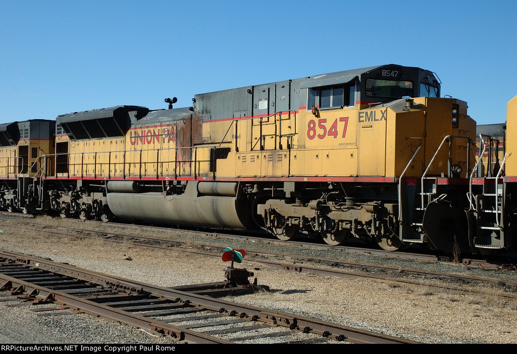 EMLX 8547, EMD SD90MAC-H, in storage on the KCS